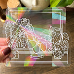 the suitcase suncatcher
