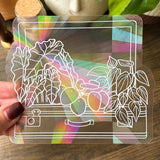 the suitcase suncatcher