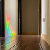 suncatchers cast rainbow on hall way